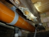 asbestos-board-debris-which-remains-to-timber-joist-ceiling