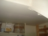 asbestos-insulation-board-to-under-stair-ceiling