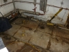 thermal-insulation-debris-to-old-boiler-room-space